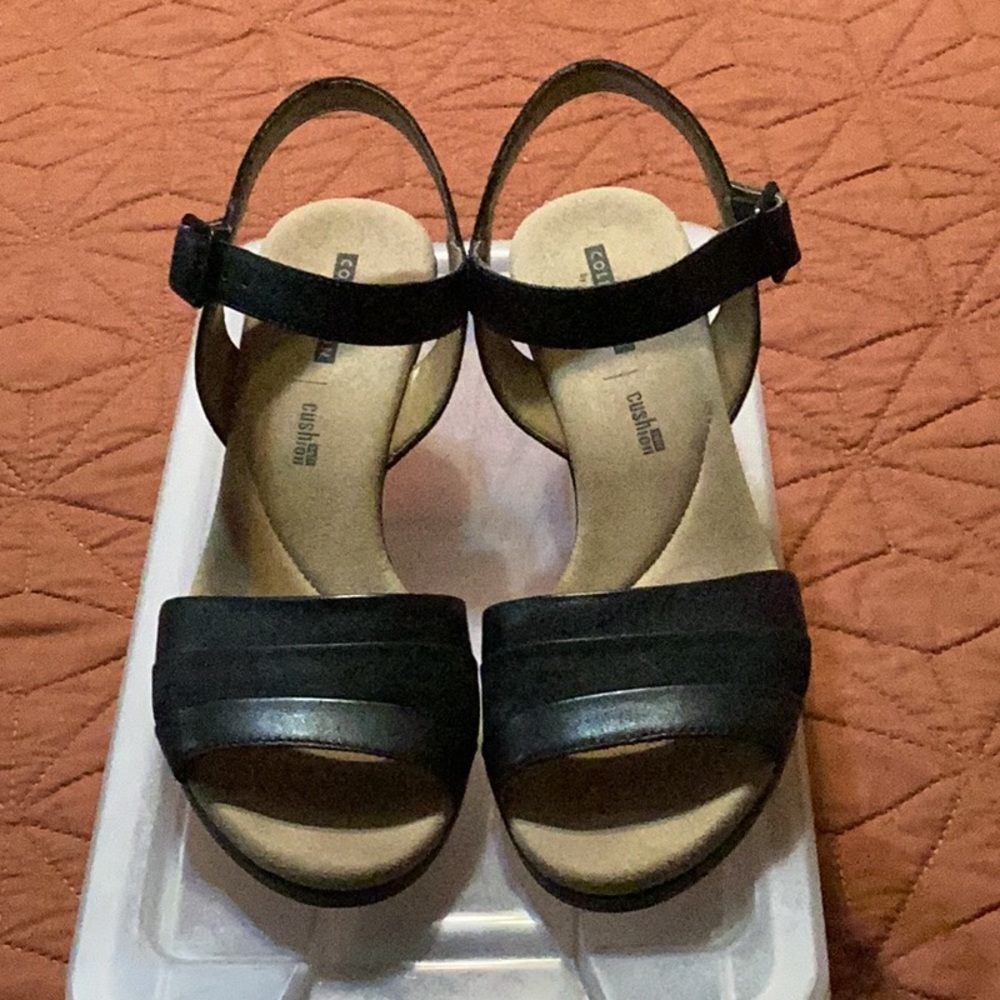 Clarks size 7M sandal.  They are man made.
